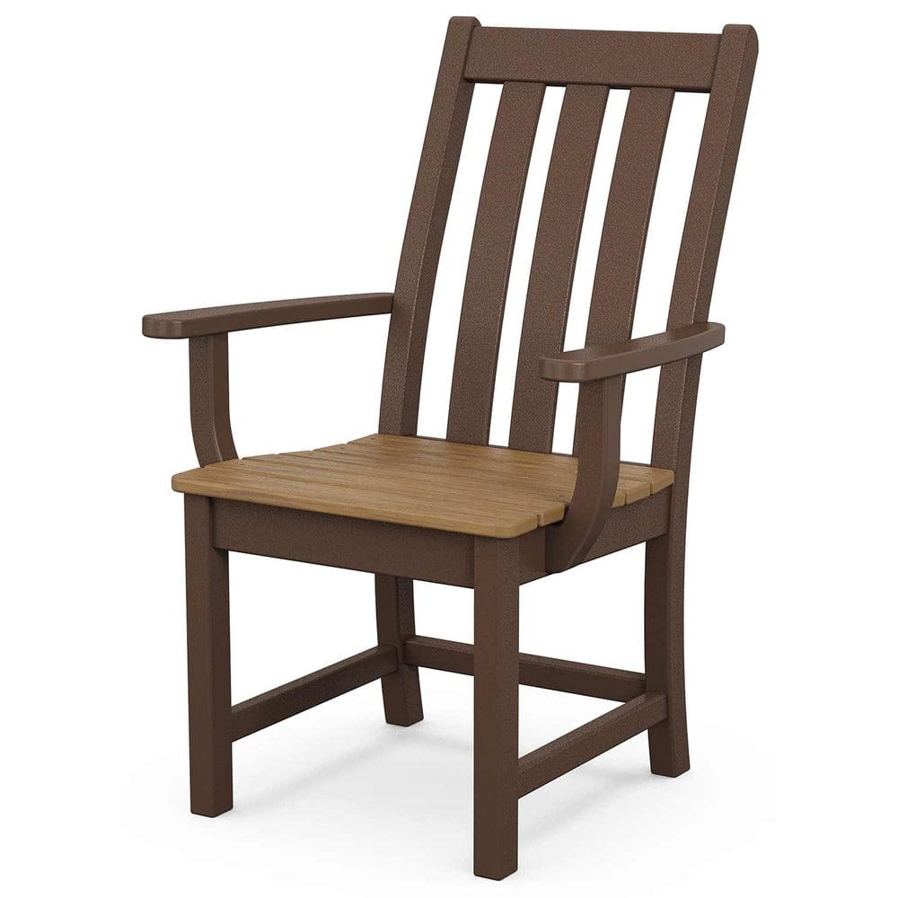 Wooden chair on a stone patio with a garden background