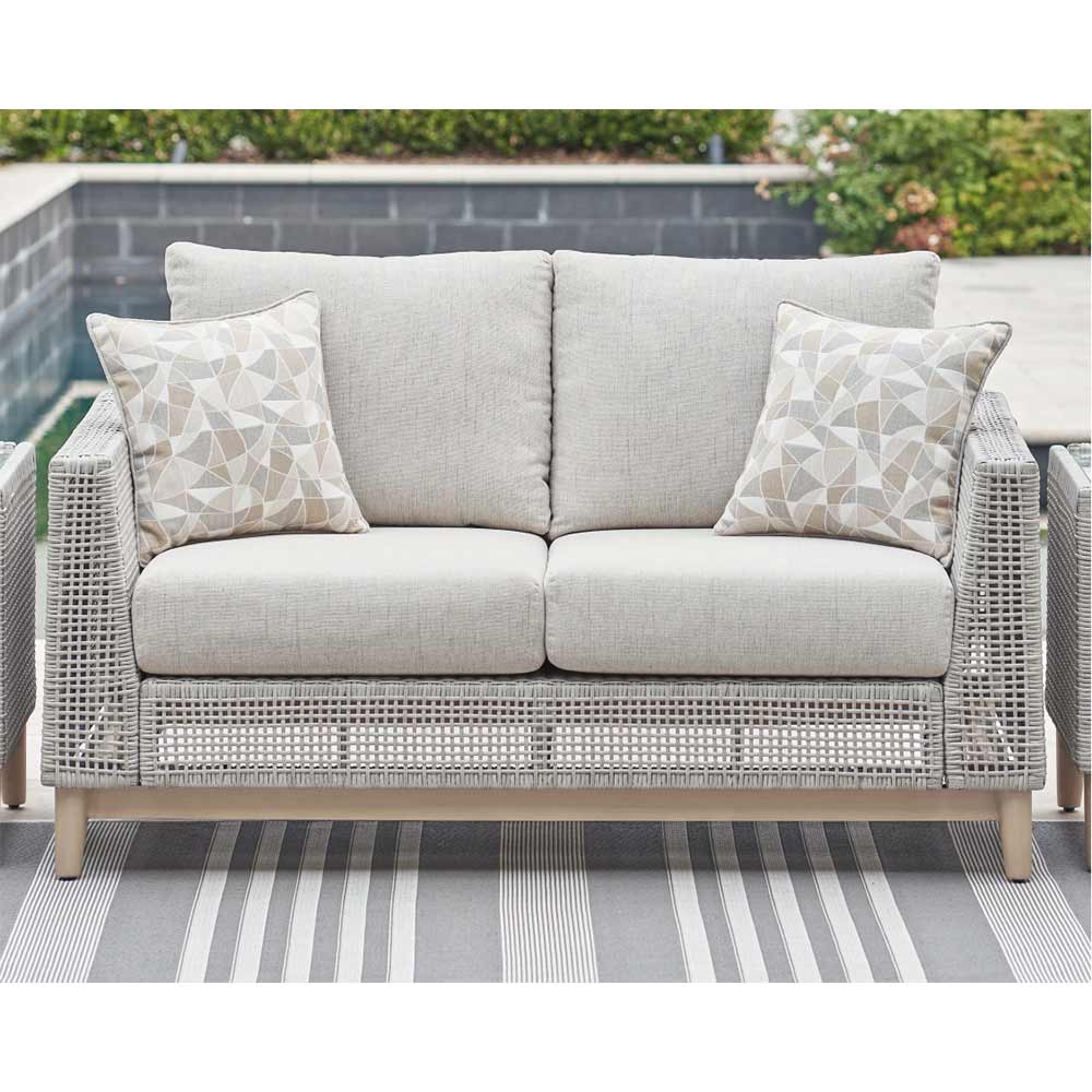 Ashley Furniture - Seton Creek Outdoor Loveseat with Cushion Loveseat Ashley Furniture