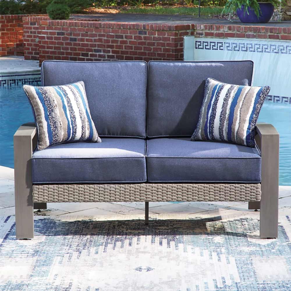 Ashley Furniture - Dillon Beach Outdoor Loveseat with Cushion Loveseat Ashley Furniture