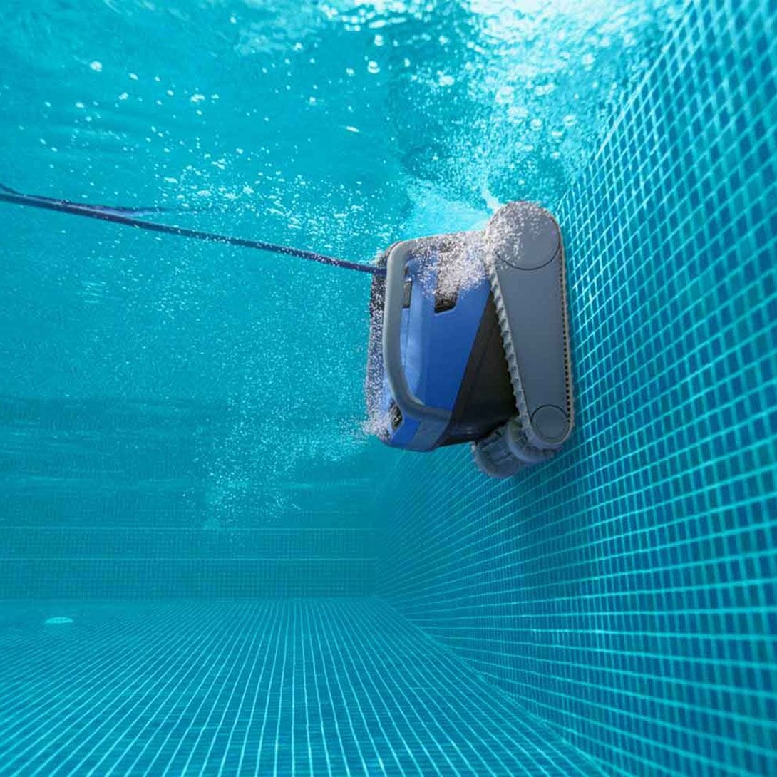 Maytronics Dolphin M600 Robotic Pool Cleaner scrubbing pool walls